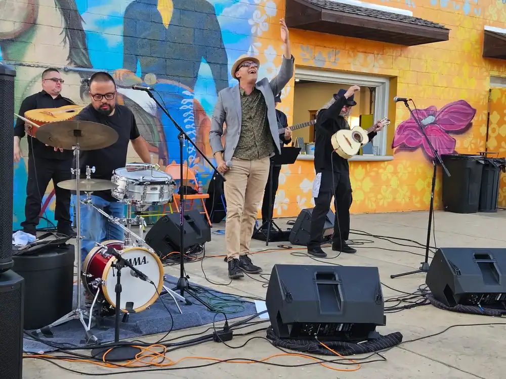 Live band performing outdoors at The Cultural Trust event, showcasing local music talent.