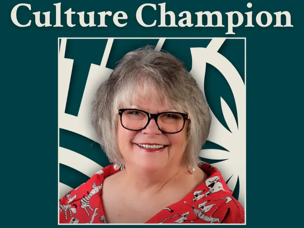 Celebrating a Culture Champion with an award at The Cultural Trust event.
