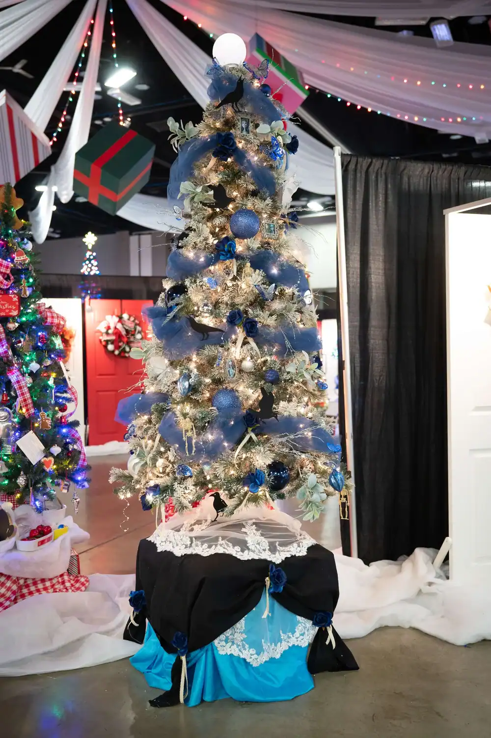 Elegant blue and silver Christmas tree decorated with ornaments and lights at The Cultural Trust.