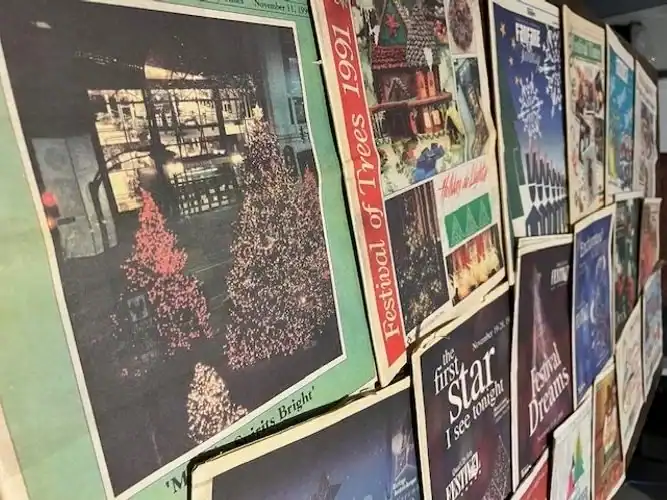 Indoor display of Festival of Trees 1991 with decorated Christmas trees.