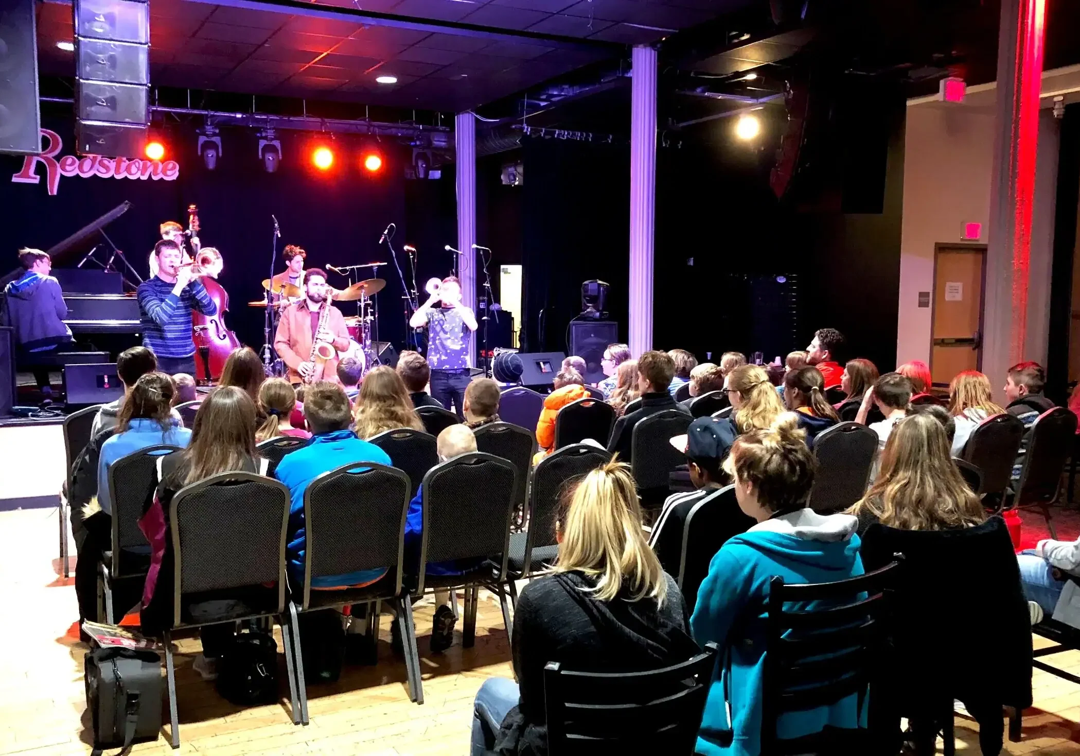 Live music performance at The Cultural Trust with audience in attendance.