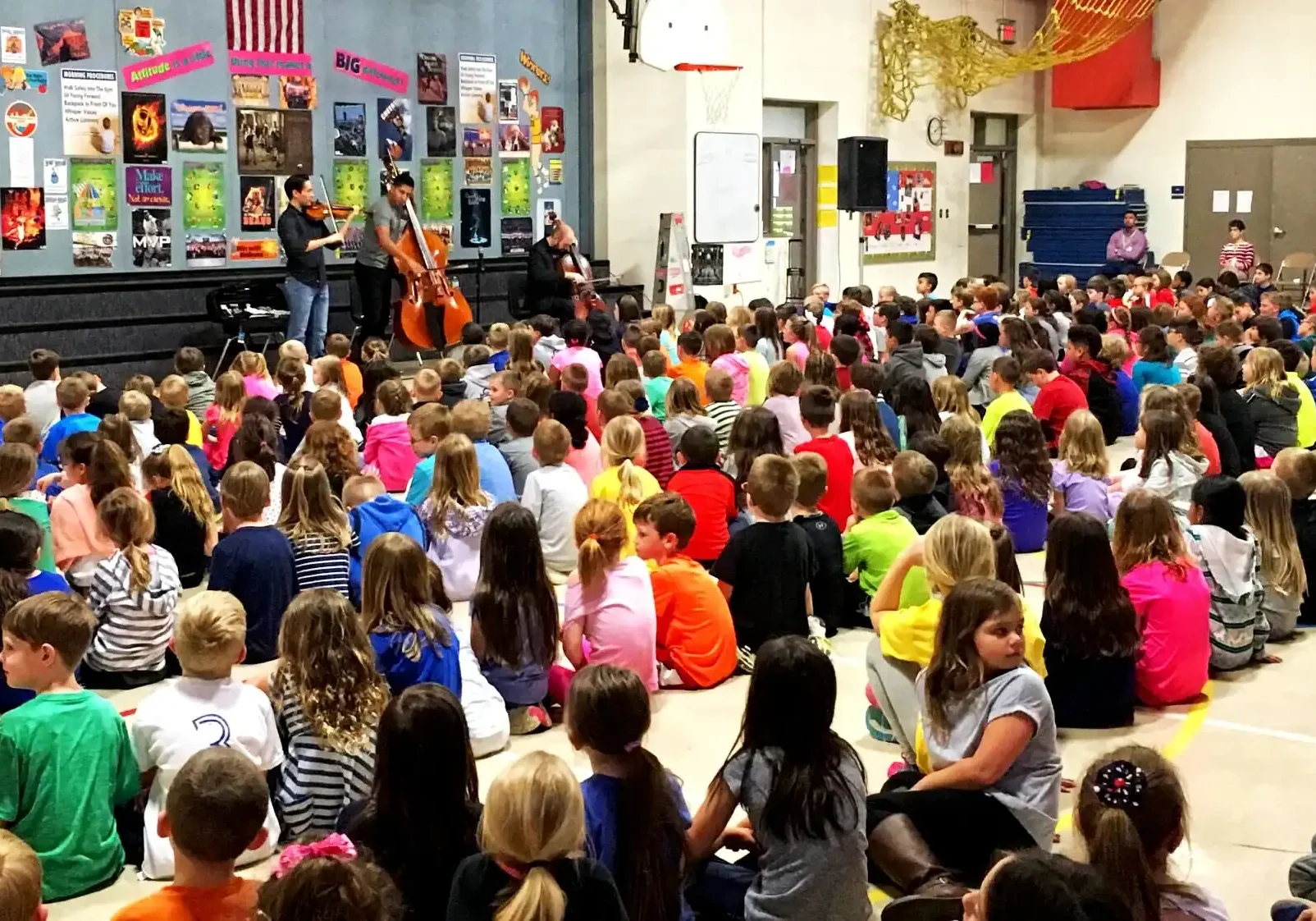 Children attending a live music performance at The Cultural Trust event.